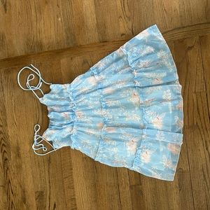 Light blue dress with orange and white details